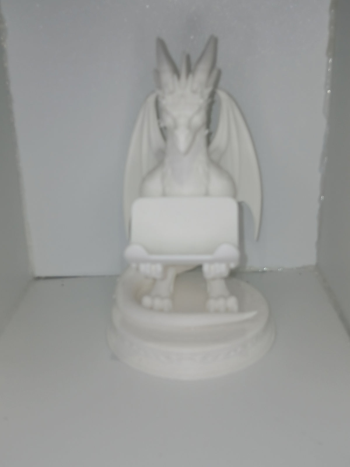 Dragon style universal controller and phone holder