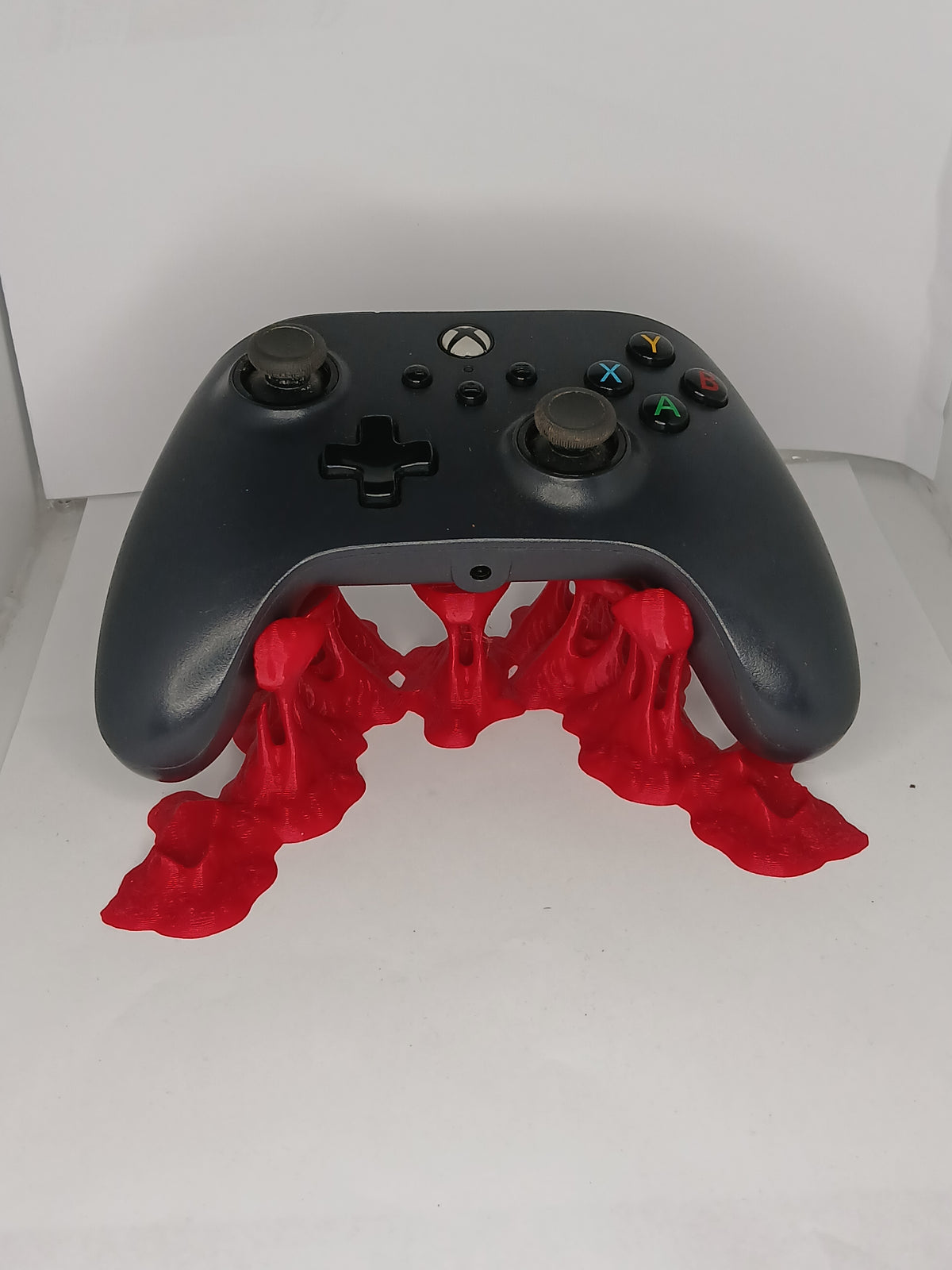 Bubble gum style universal controller stand