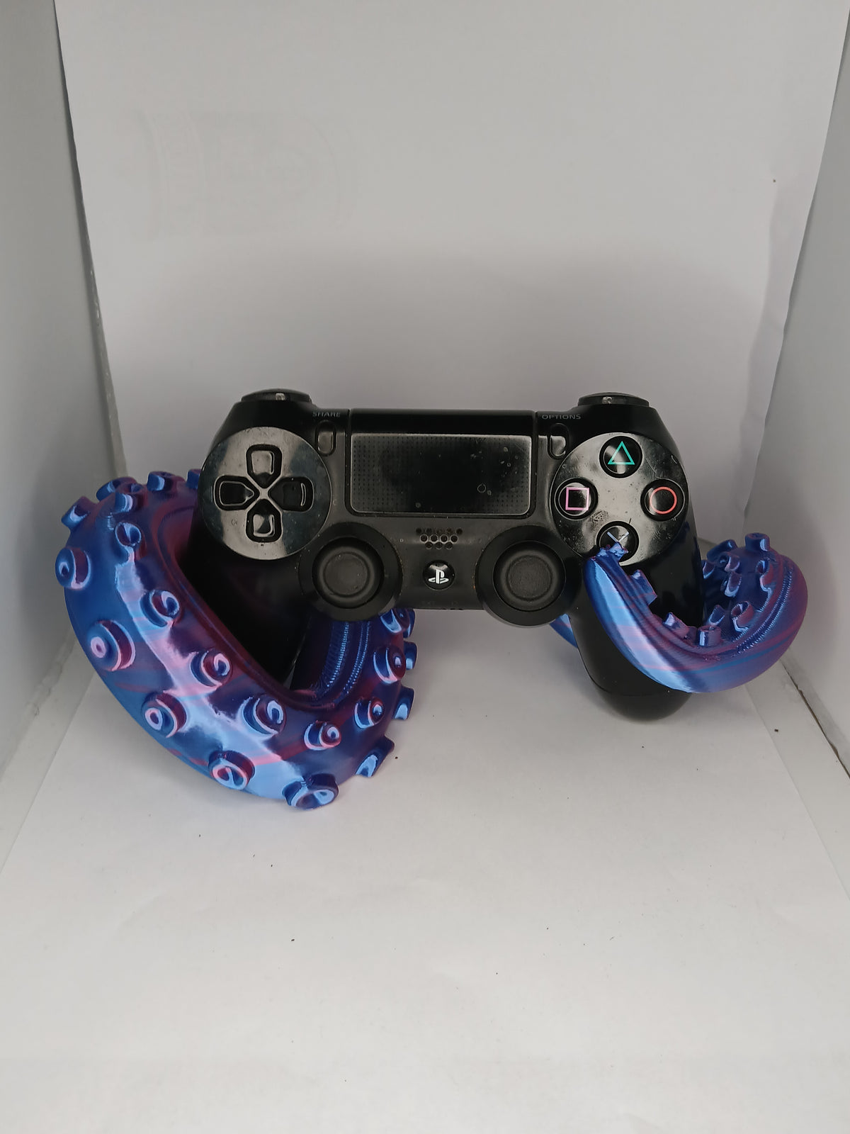 Tenticle style universal controller stand