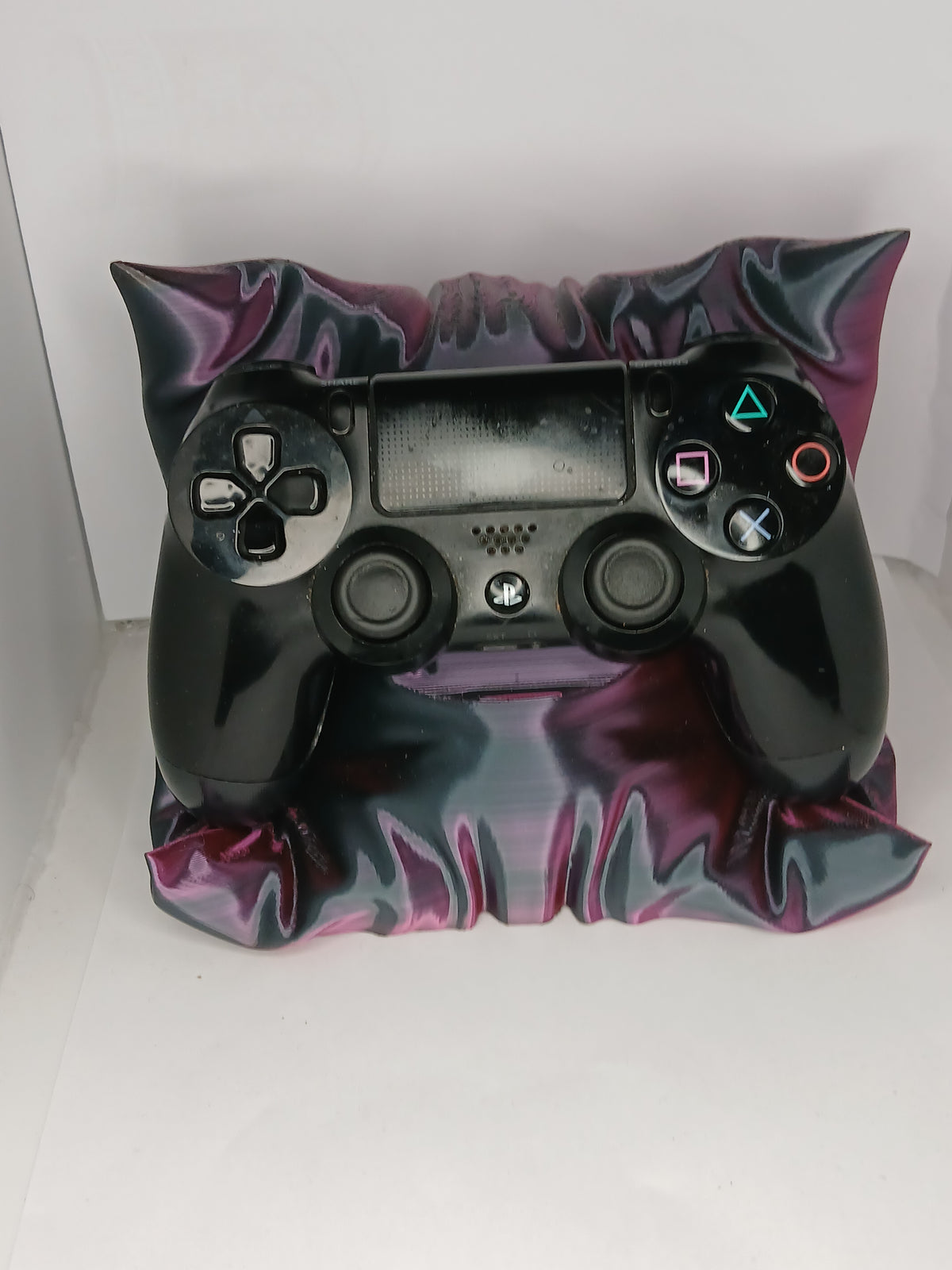 Pillow style controller stand