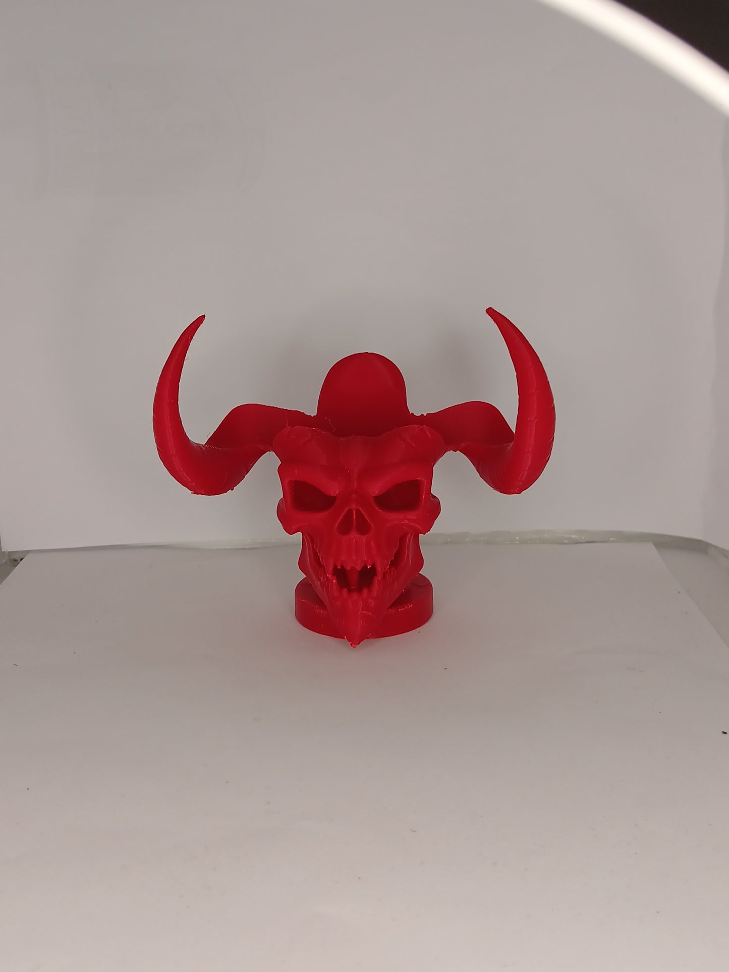 Horned demon skull controller stand